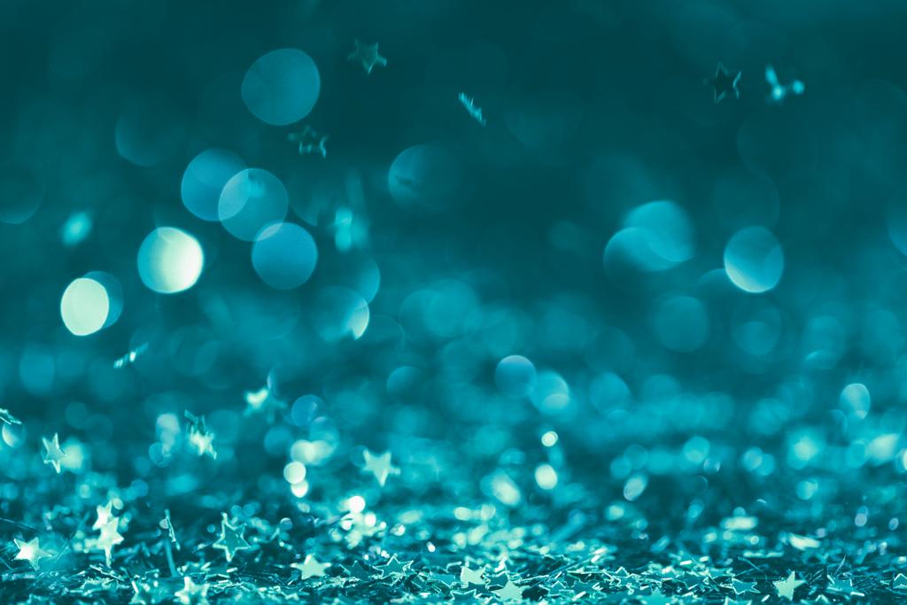 ターコイズ ブルーの色調で紙吹雪を輝かせてお祭りの背景 ロイヤリティフリー写真 画像素材