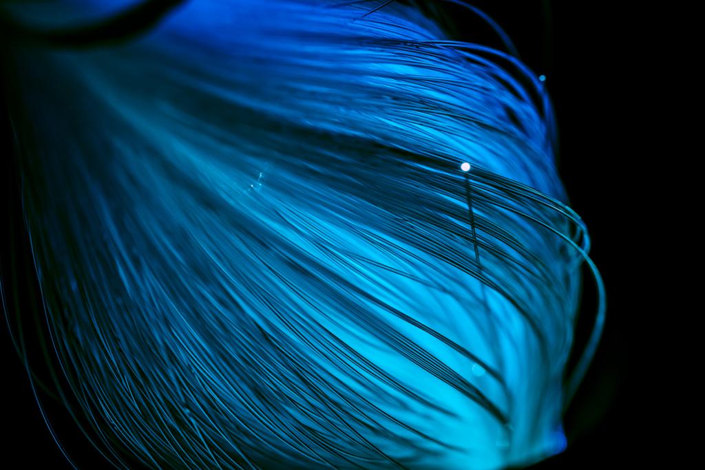 輝く青い光ファイバー スレッド テクスチャのクローズ アップ ロイヤリティフリー写真 画像素材