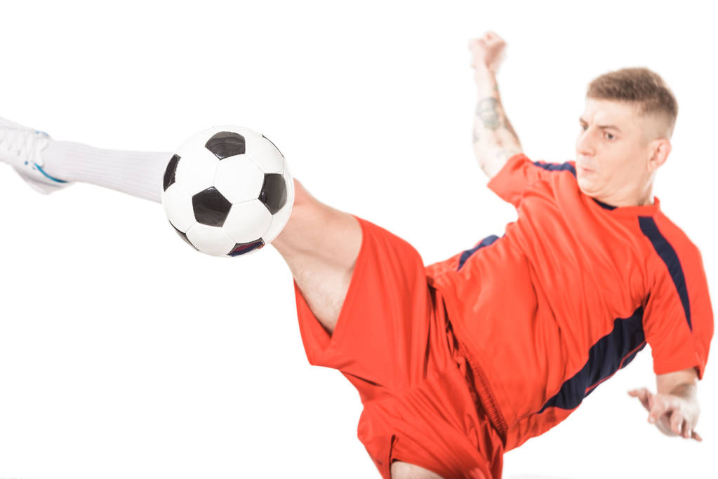 Close Up View Of Young Soccer Player Hitting Ball With Leg Isolated On White Free Stock Photo And Image