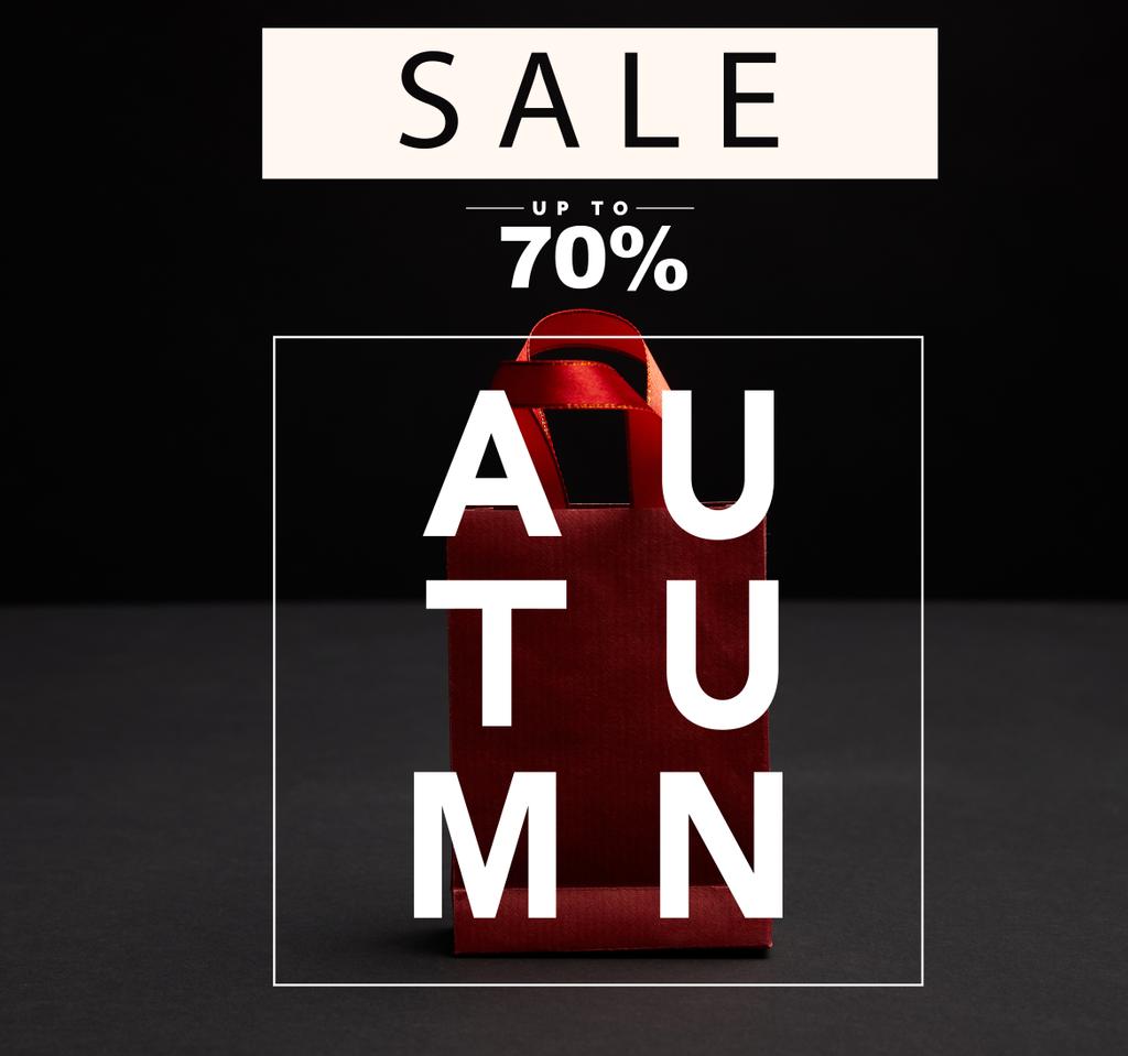 クローズ アップ秋セール 70 パーセント割引で黒の背景に赤い紙の買い物袋の表示 ロイヤリティフリー写真 画像素材