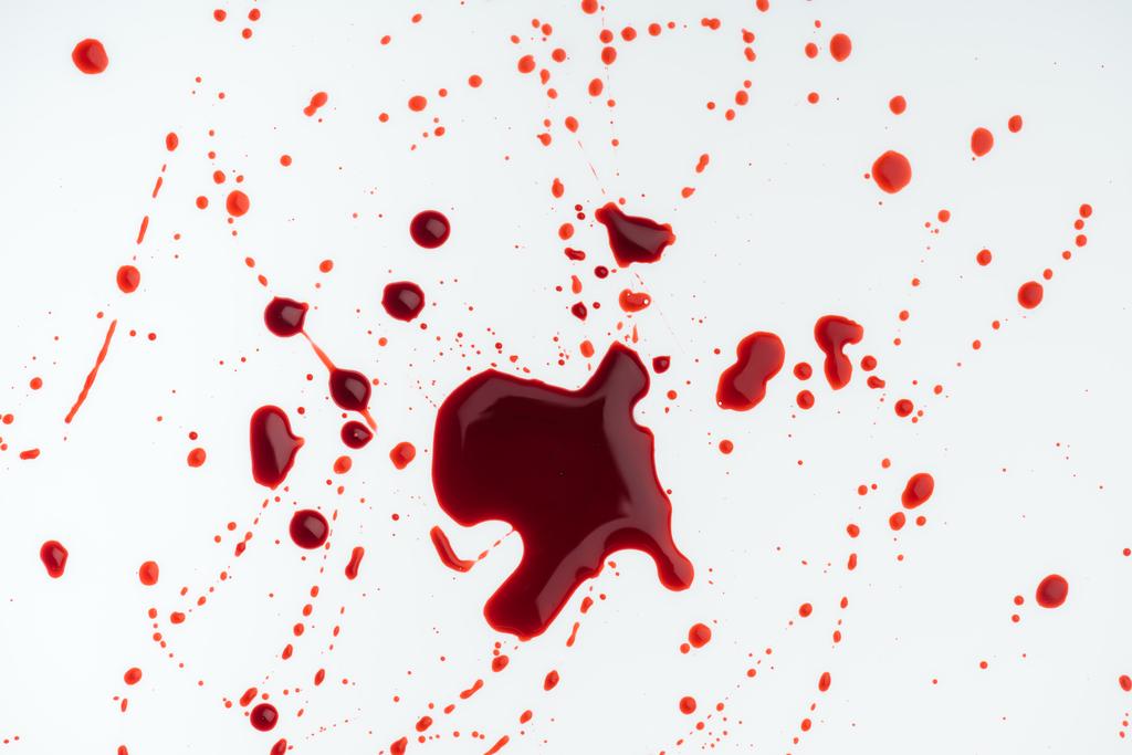 血飛沫で覆われた白い表面のトップ ビュー ロイヤリティフリー写真 画像素材
