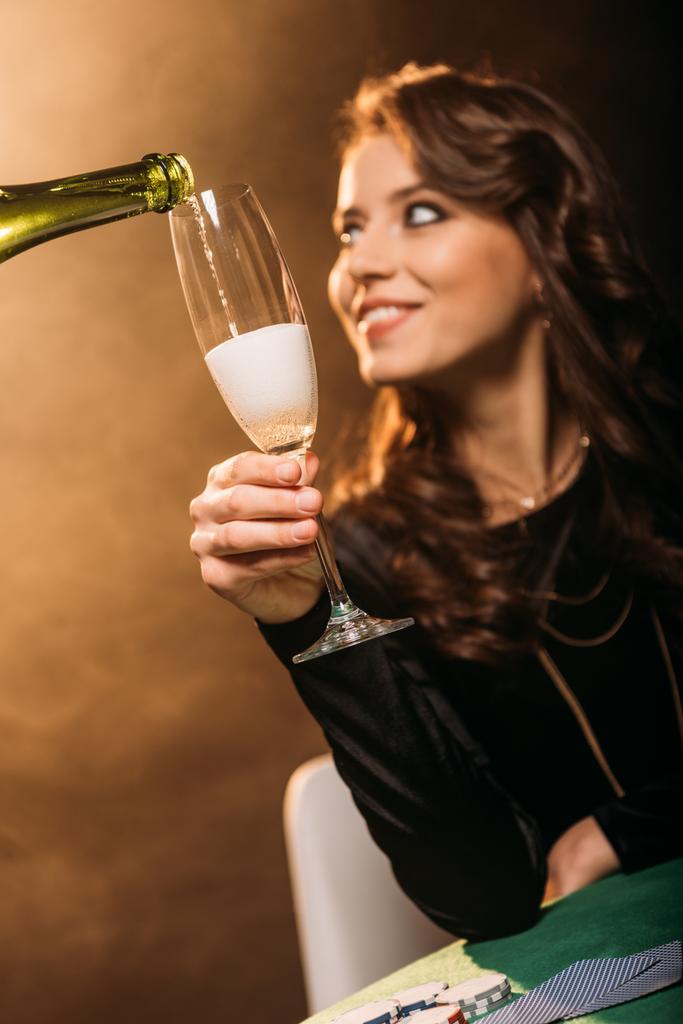 Selective Focus Of Waiter Pouring Champagne In Free Stock Photo and Image