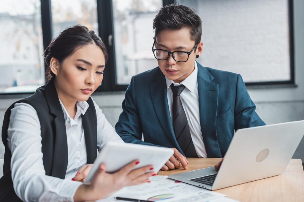 Focused Young Asian Business People Working With Free Stock Photo and Image