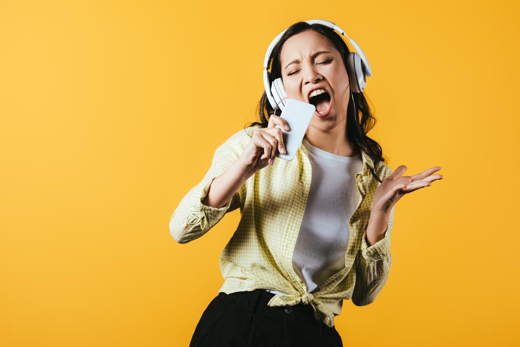 Attractive Asian Girl Singing And Listening Music Free Stock Photo and Image