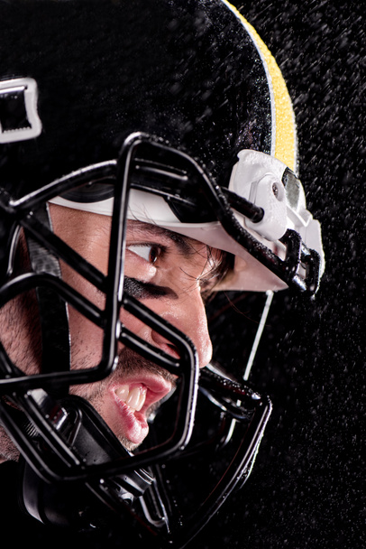 Close Up Side View Of Angry Man American Football Player In Helmet Isolated On Black Royalty Free Photo And Stock Image