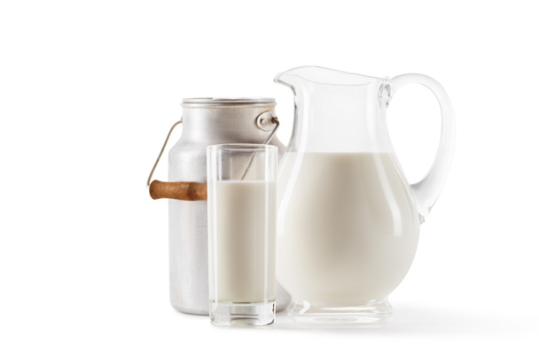 Fresh milk in jug, bottle and glass isolated on white Free Stock Photo and  Image