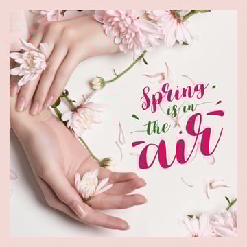 Female hands with spring flowers