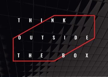 Think outside the box Quote on black tiles