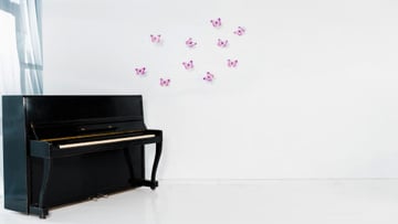 White room with Piano and Butterflies on Wall