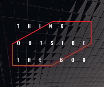 Think outside the box Quote on black tiles