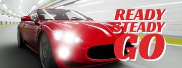 Red sports car driving fast