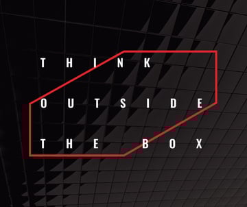 Think outside the box Quote on black tiles
